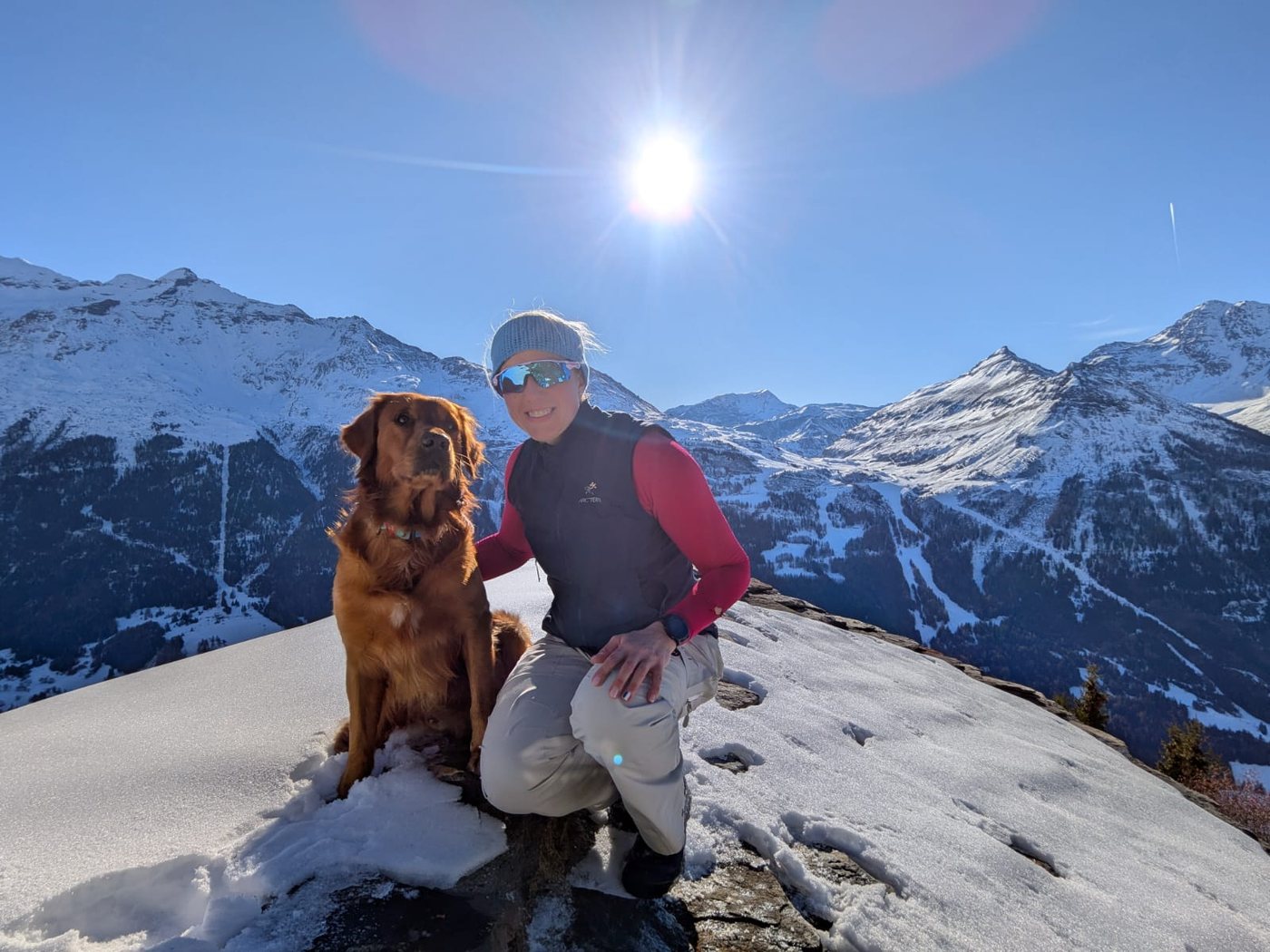 Menucha with her Golden Retriever Enso in the mountains